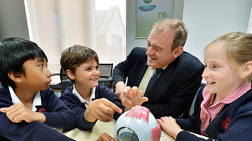 Ed Davey with a group of school children